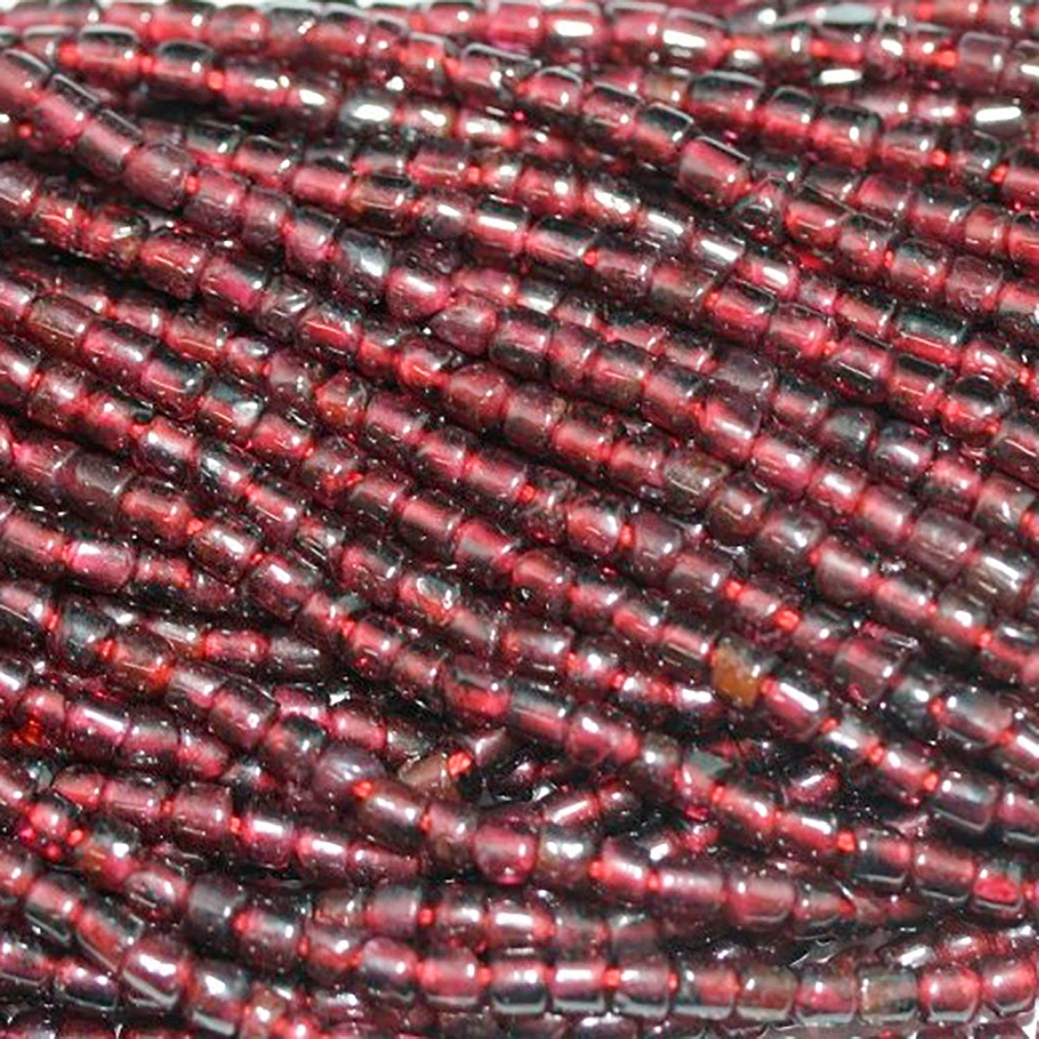 13" St Garnet Smooth Tube Beads 3x2mm.-Strand 37cm