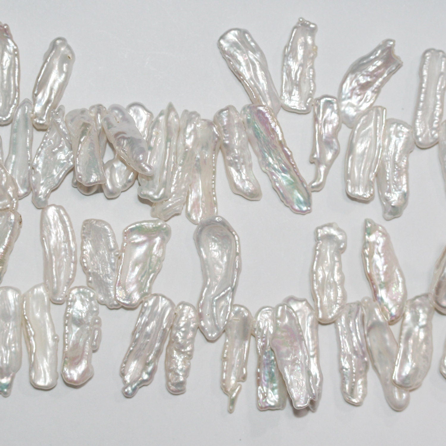 Perles de culture Biwa d'eau douce, 15 pouces (environ 38 cm), 20 x 7 mm. Longueur du collier : 38 cm. Prix de gros des perles naturelles.