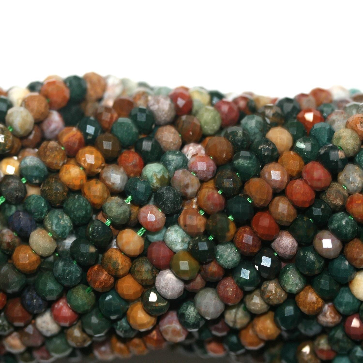 Perles rondelles à facettes en jaspe St Ocean 15" 6x4mm.-Rig 39cm.