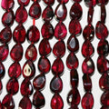 13" St Garnet Faceted Drop Beads 6x4mm.-Strand 37cm