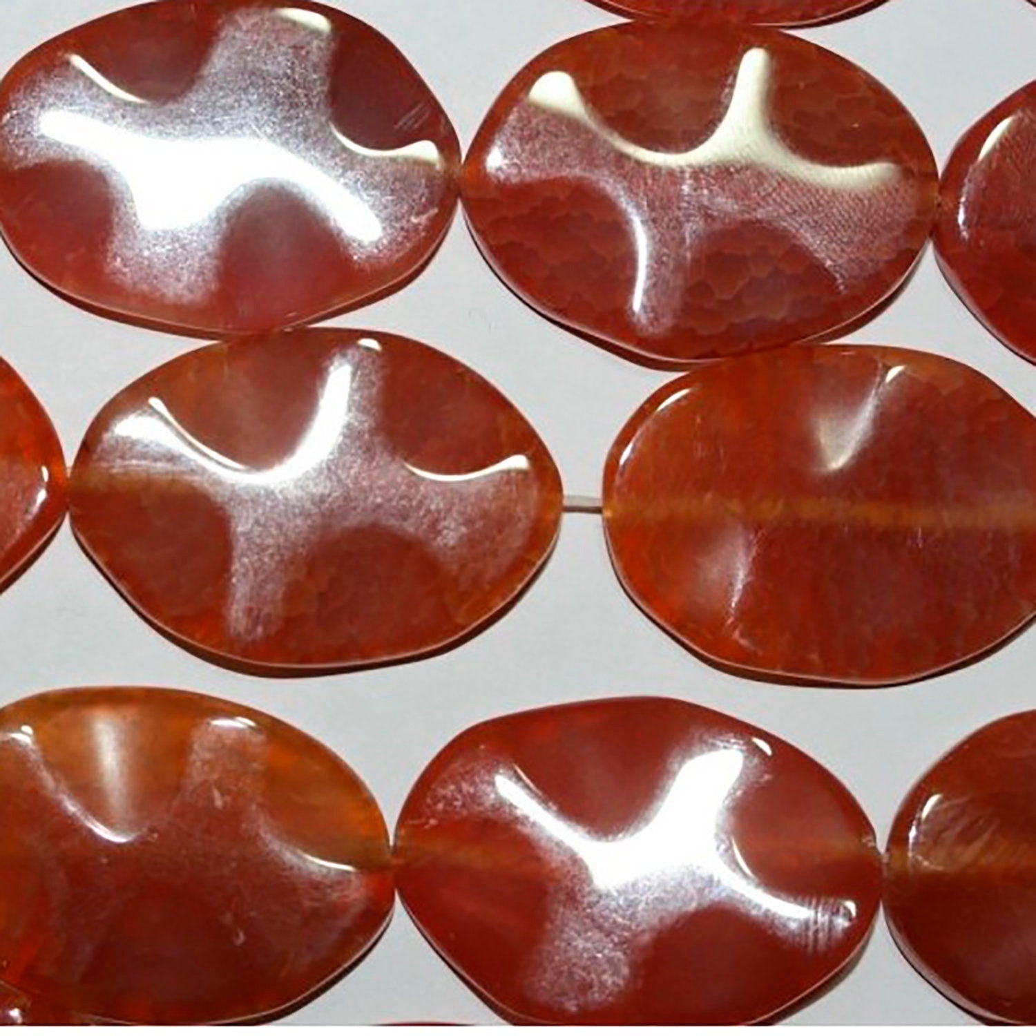 Cuentas ovaladas lisas de ágata de fuego de 40 cm (16"), 35 x 25 mm (aprox. - Hilo de 40 cm)