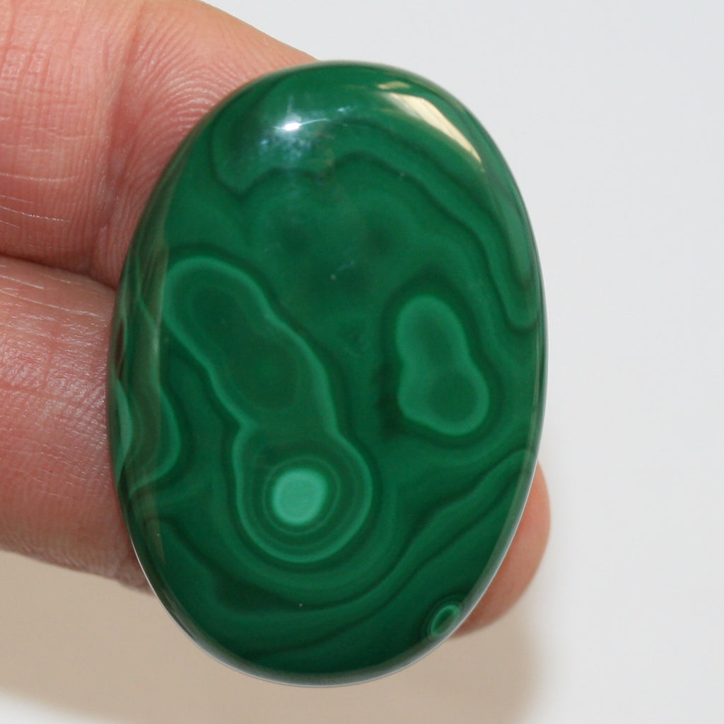 Malachite Oval Cabochon 44x30mm.(109.3ct)