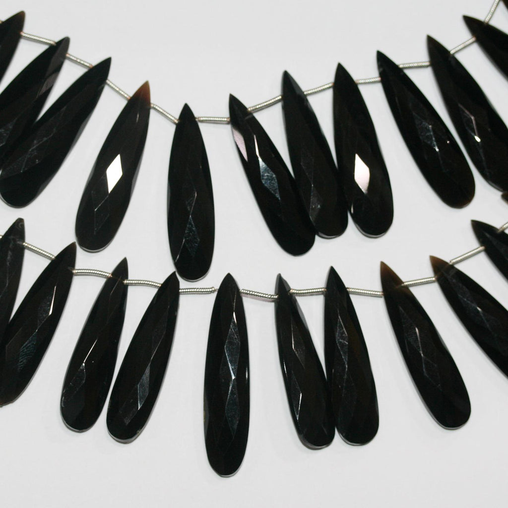 Cuentas de ónix facetado de 7" de St., 40 x 10 mm, hilo de 18 cm.