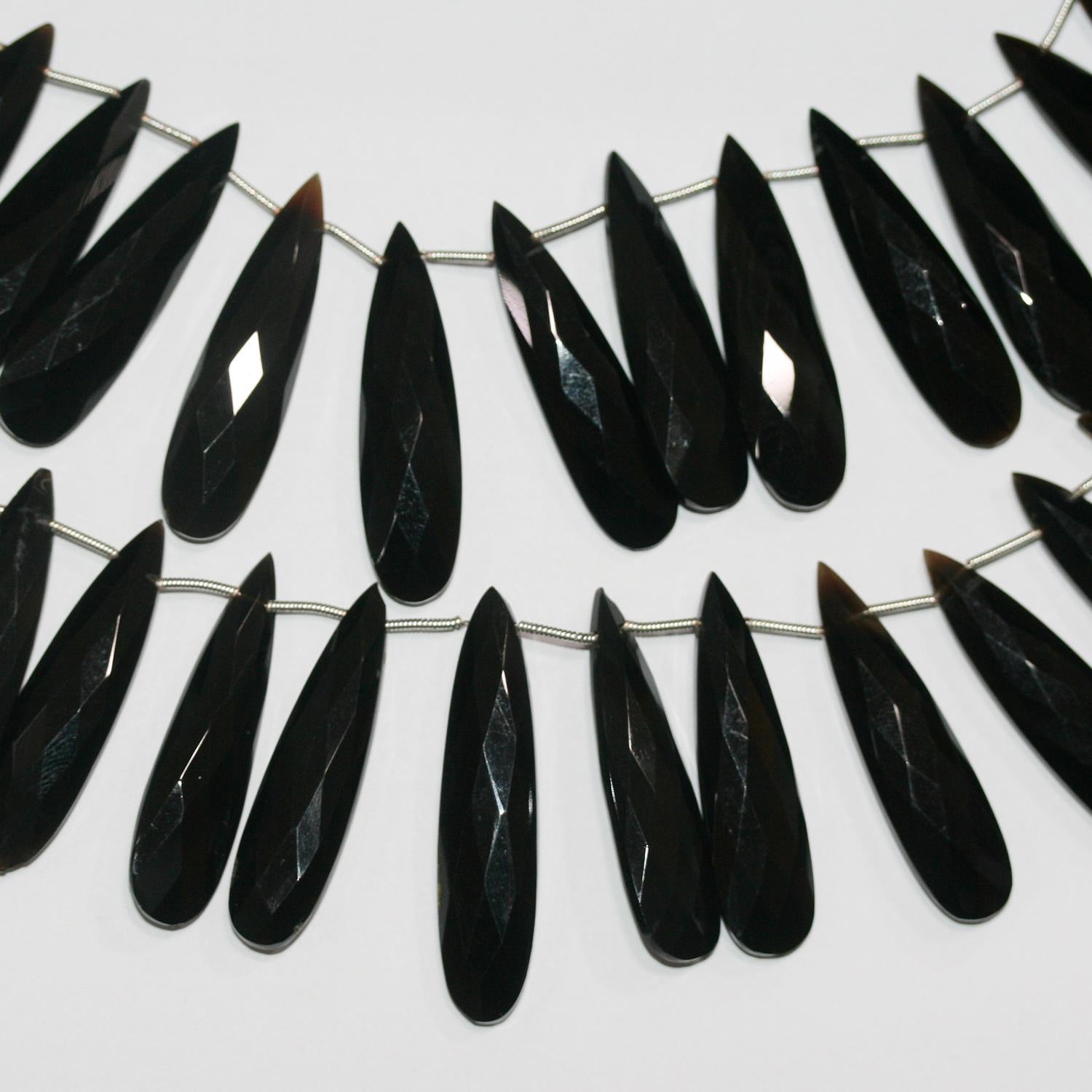 Cuentas de ónix facetado de 7" de St., 40 x 10 mm, hilo de 18 cm.