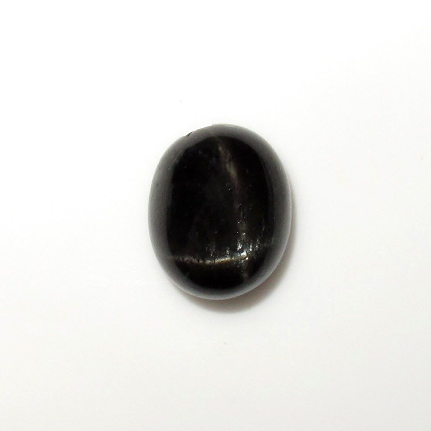 Lote de 2 cabujones ovalados de diópsido estrella de 11 x 9 mm. (2 uds.)