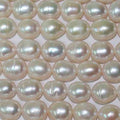 Perles ovales d'eau douce de 15 pouces (38 cm), 9-10 mm, rang de 39 cm. Perles naturelles à prix de gros.