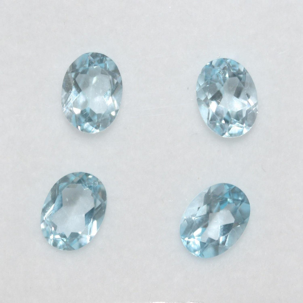 Lote de 4 topacios azul cielo facetados ovalados de 8 x 6 mm. (4 piezas).