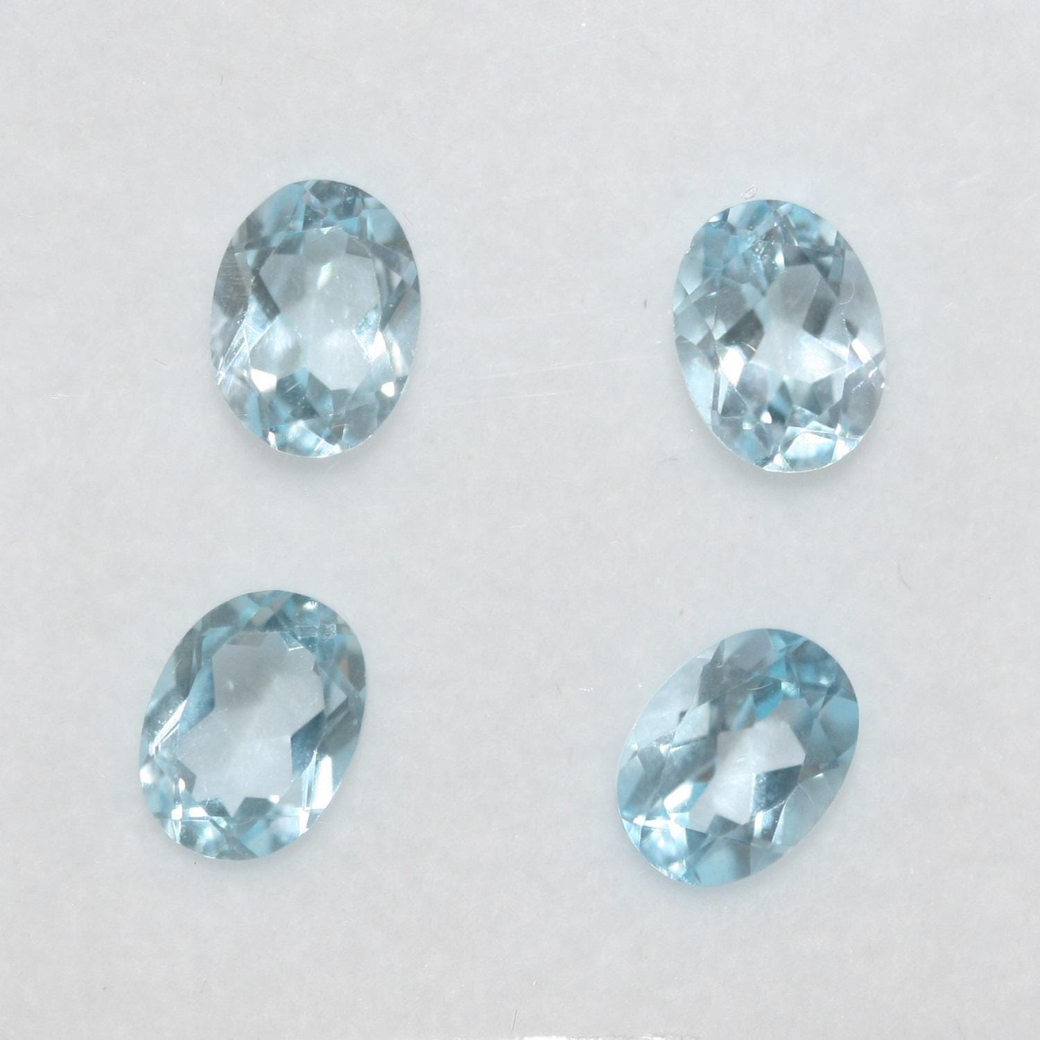 Lote de 4 topacios azul cielo facetados ovalados de 8 x 6 mm. (4 piezas).