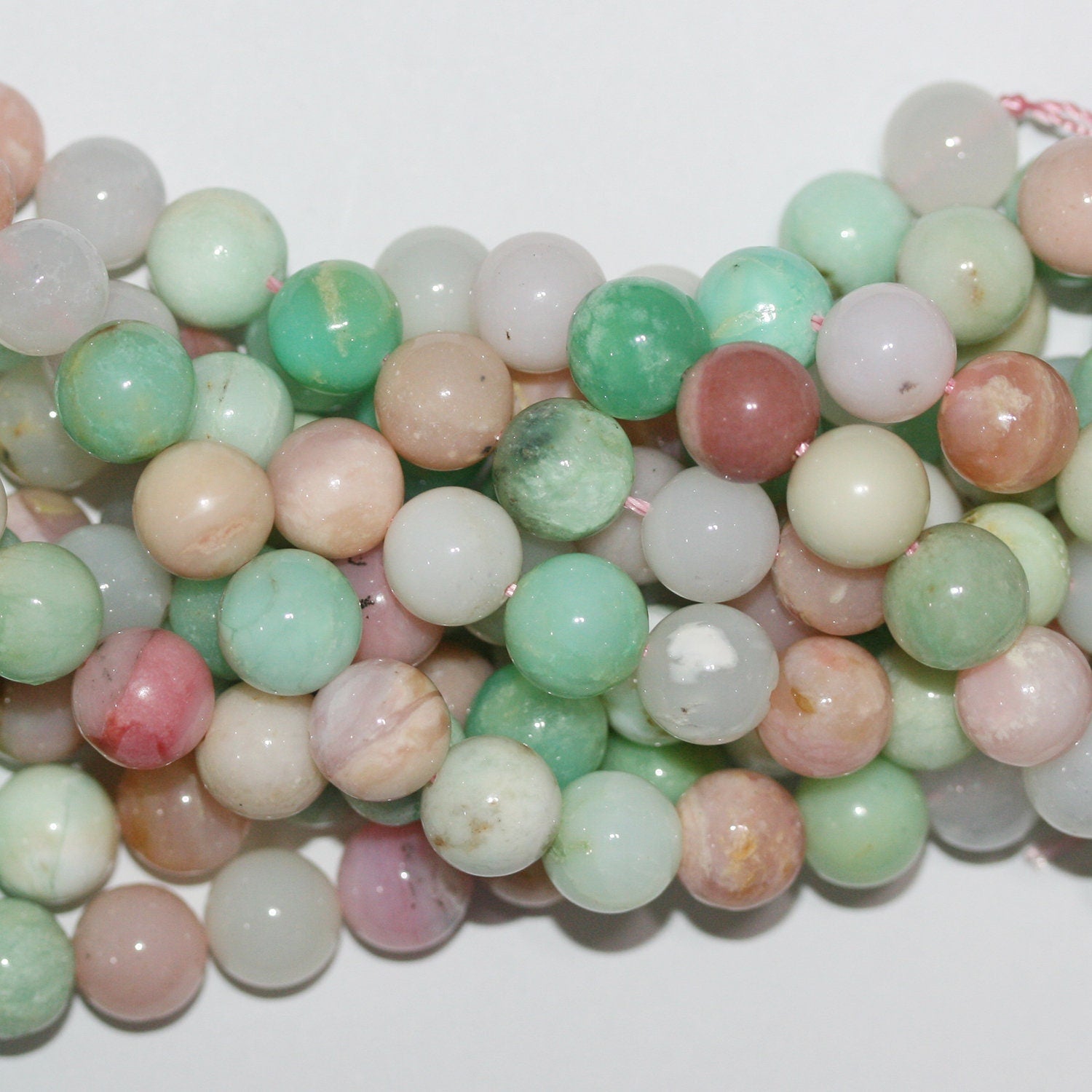 15" Sainte Chrysoprase - Perles rondes lisses en opale rose 10 mm - Fil de 39 cm.