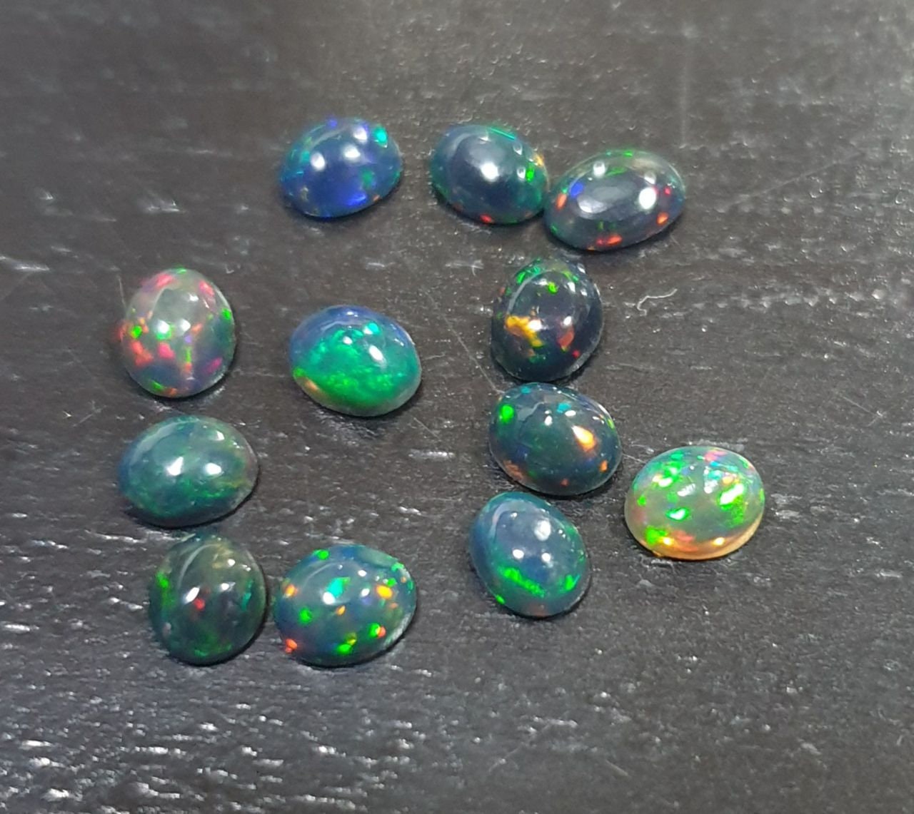 Ethiopian Black Opal Lot Oval Cabochon 5x4mm. (12pcs)  -Gemstone Parcels-Loose Stones Wholesale Price