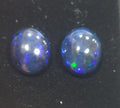 Lote de 1 par de ópalos negros etíopes, cabujón ovalado de 12 x 10 mm (2 unidades), 5,5 cts. Precio al por mayor.