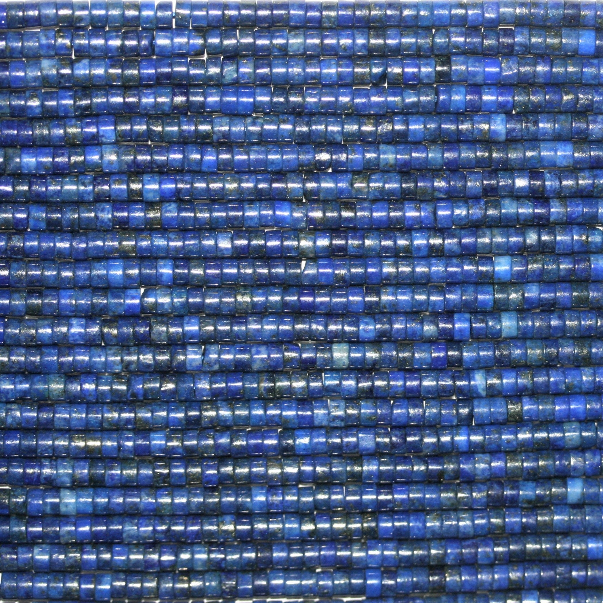 Perles disques lisses en lapis-lazuli de 15 pouces, 4 x 2 mm. - Brin de 39 cm.