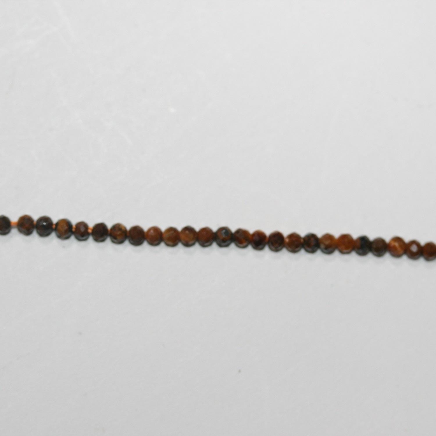 Cuentas redondas facetadas de ojo de tigre de 40 cm (16"), 2 mm (tira de 40 cm) - Artículo 14850