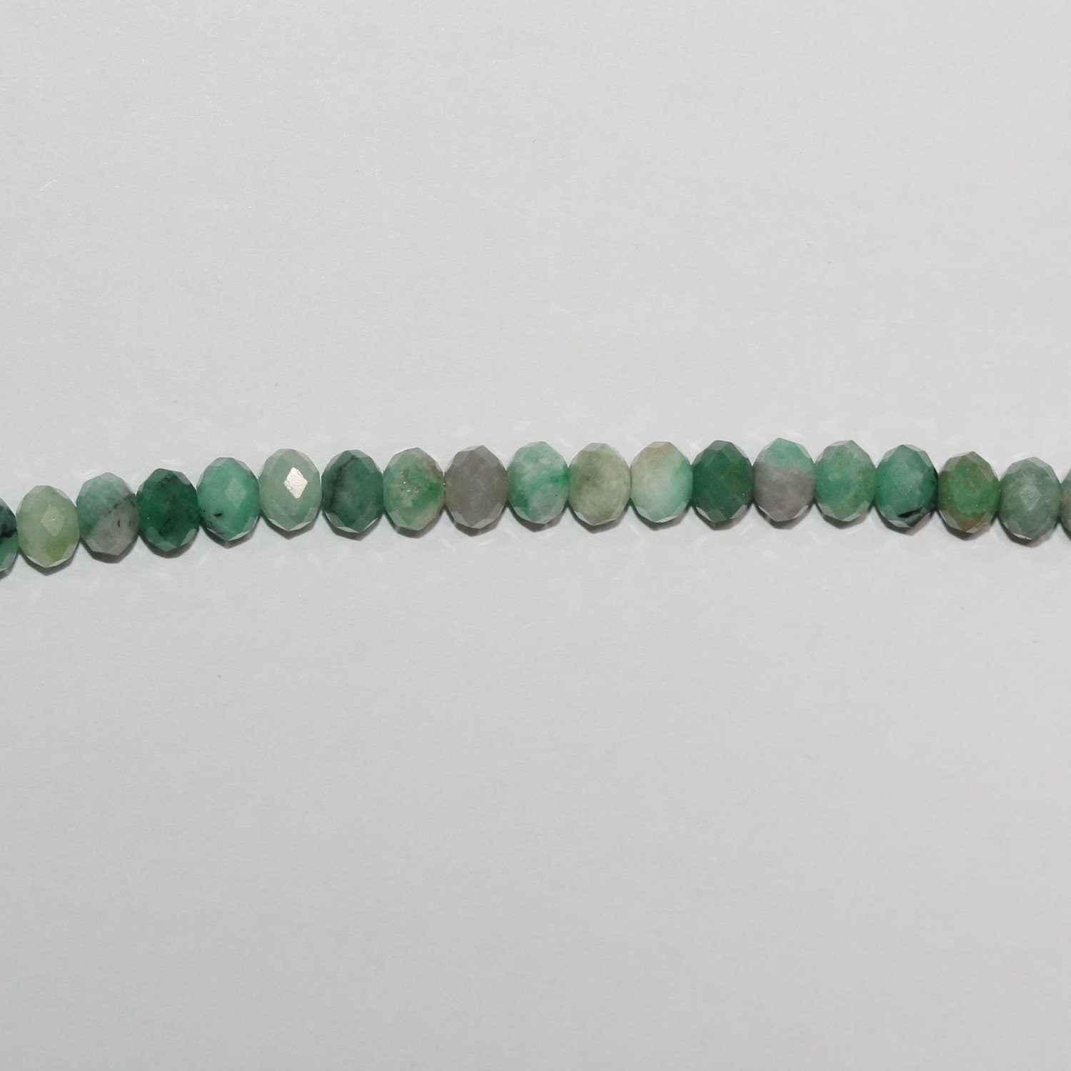 Perles rondelles à facettes St Emerald 15" 6x4mm.- Brin 39cm.