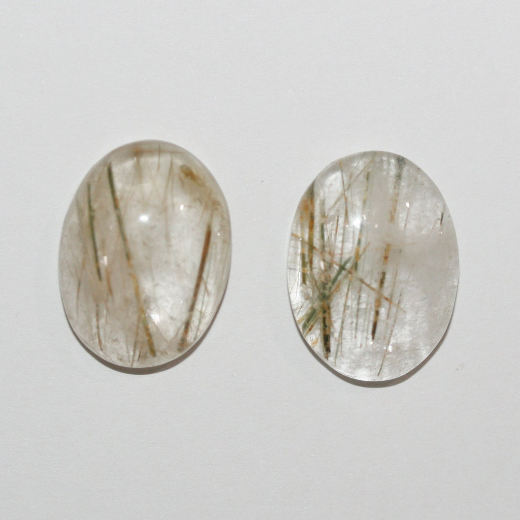Lote de 2 cabujones ovalados de cuarzo rutilado de 20 x 15 mm. (2 uds.)