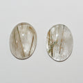 Lote de 2 cabujones ovalados de cuarzo rutilado de 20 x 15 mm. (2 uds.)