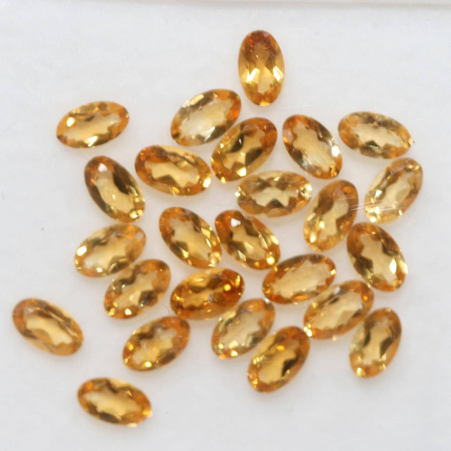 Lot de citrine ovale à facettes 5x3mm. (5CT).
