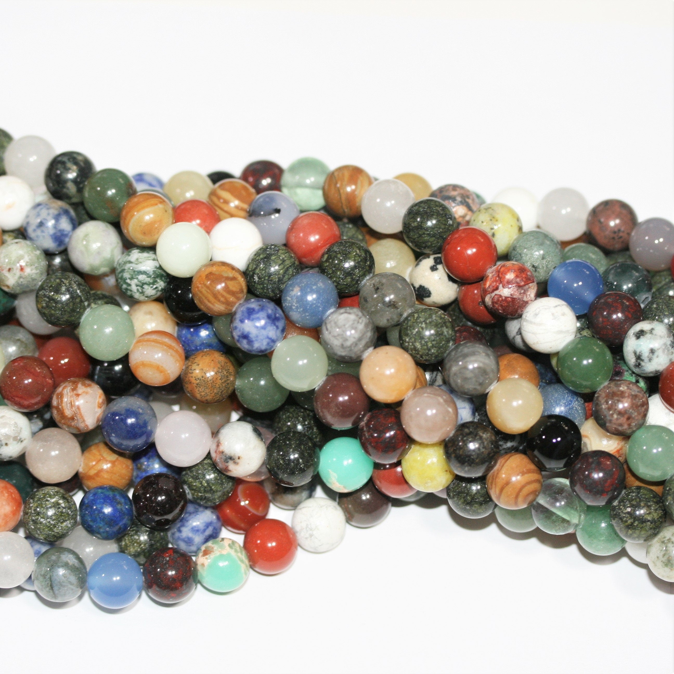 Perles rondes lisses en pierre multicolore 10 mm - Fil de 39 cm - Article 13152