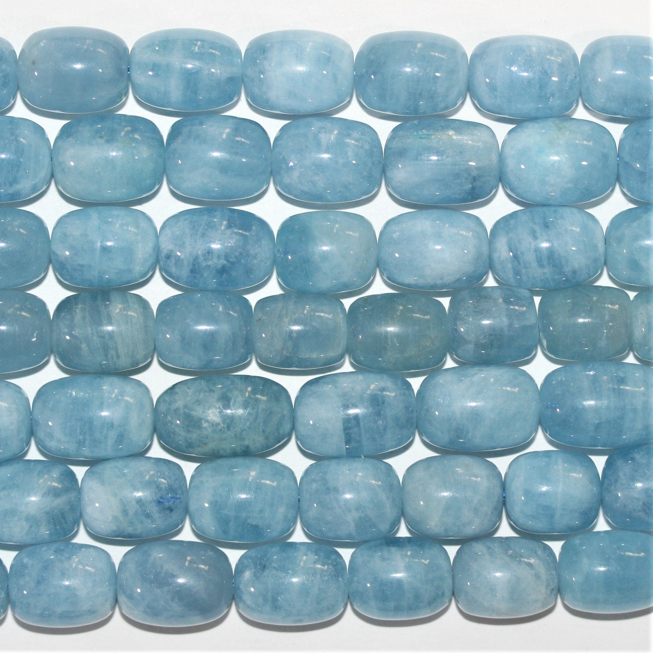 Cuentas de aguamarina lisas de 16" (16 x 12 mm). Longitud aproximada: 40 cm.