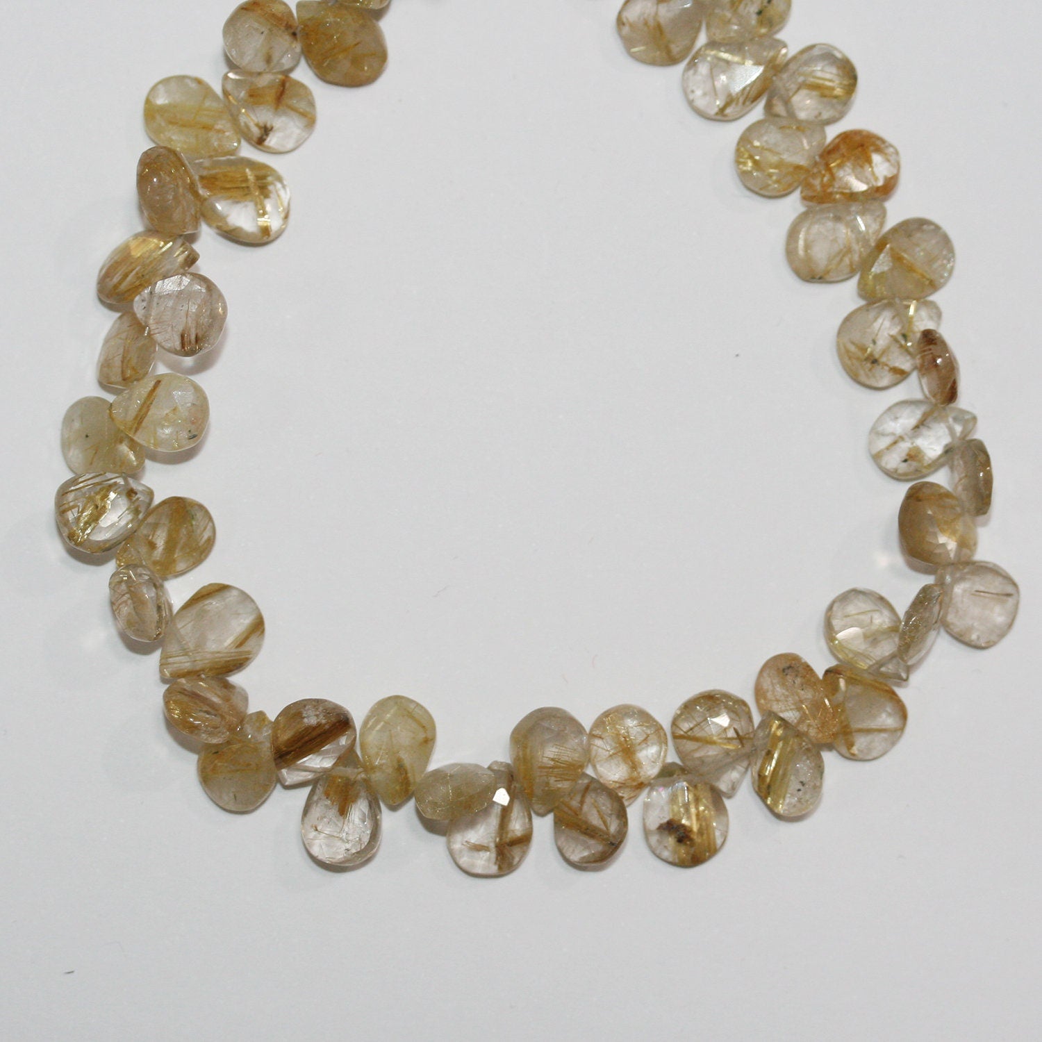 Perles en quartz rutile facettées de 23 cm (9 pouces), 10 x 7 mm, longueur 23 cm.