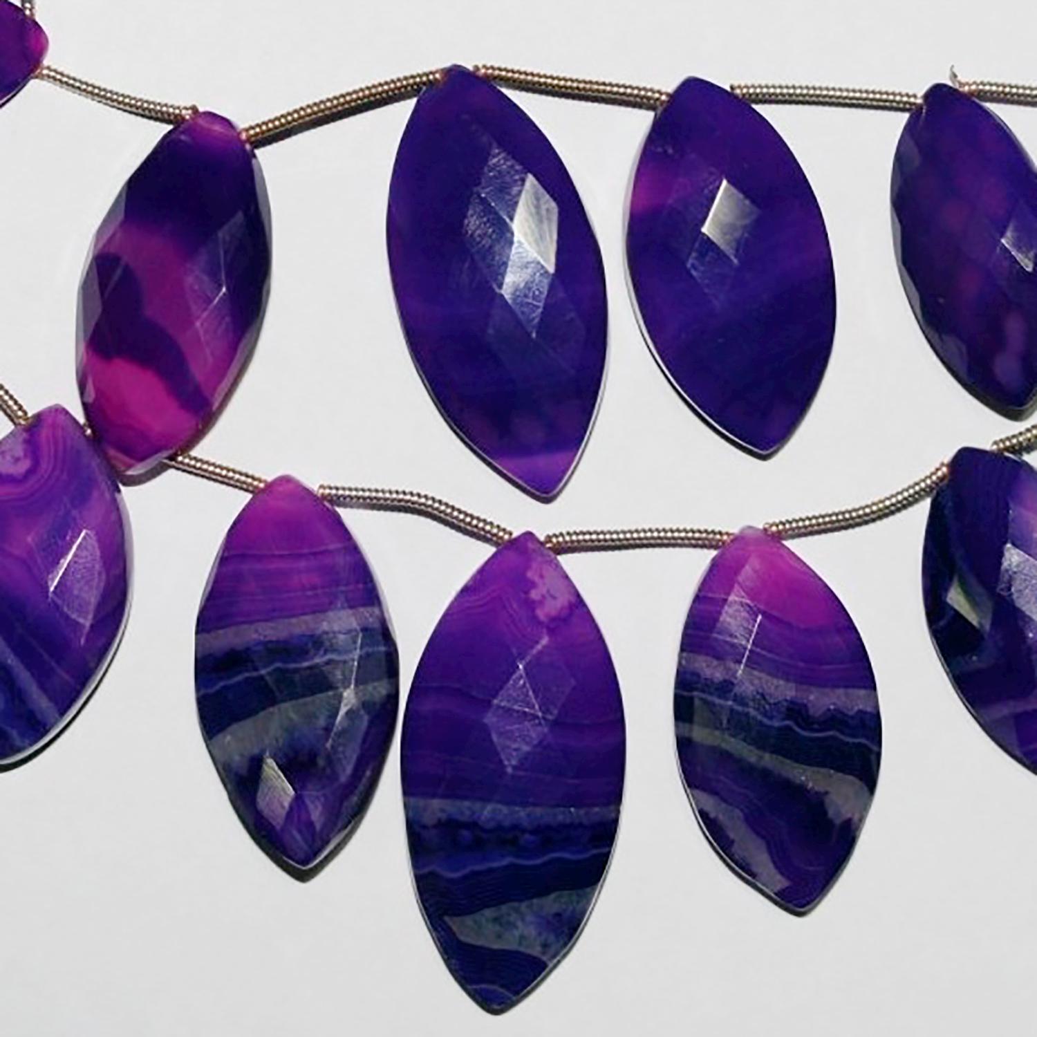 Cuentas de calcedonia púrpura de 18 cm, facetadas y graduadas, de 21 x 10 a 34 x 20 mm. Tira de aprox. 18 cm.