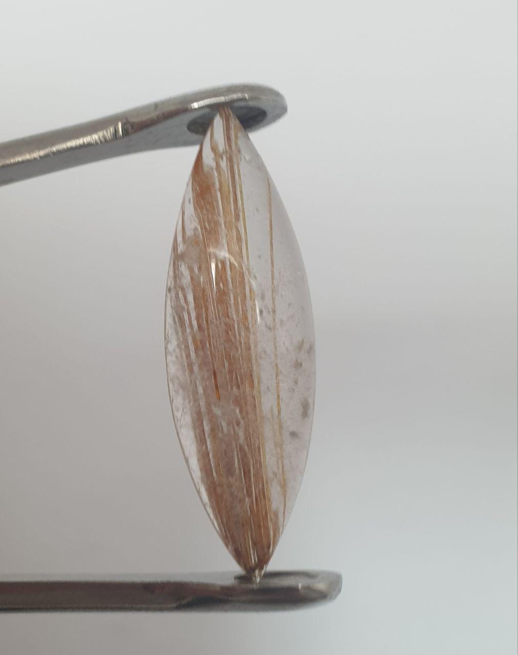 Rutilated Quartz  Marquise  Cabochon 27.5x8.8mm. (6.7ct.)