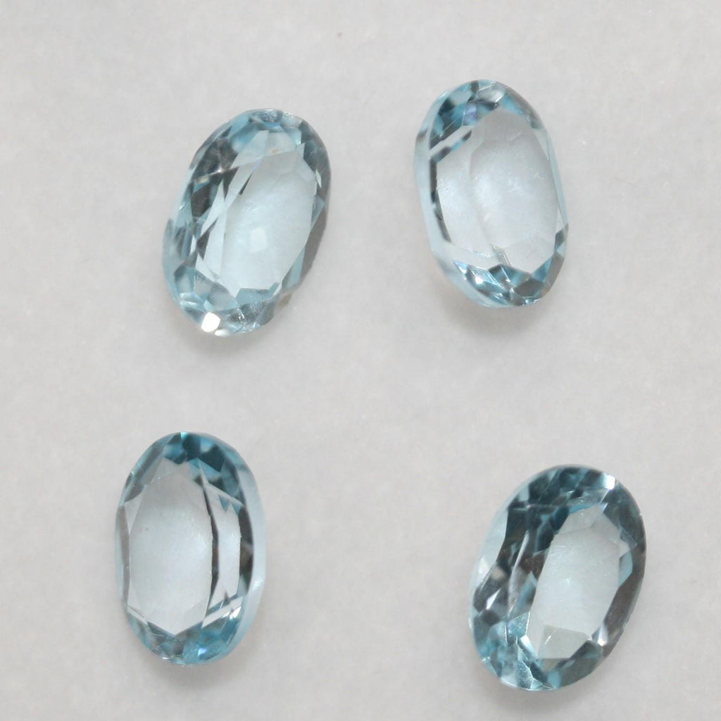 Lote de 4 topacios azul cielo facetados ovalados de 8 x 6 mm. (4 piezas).
