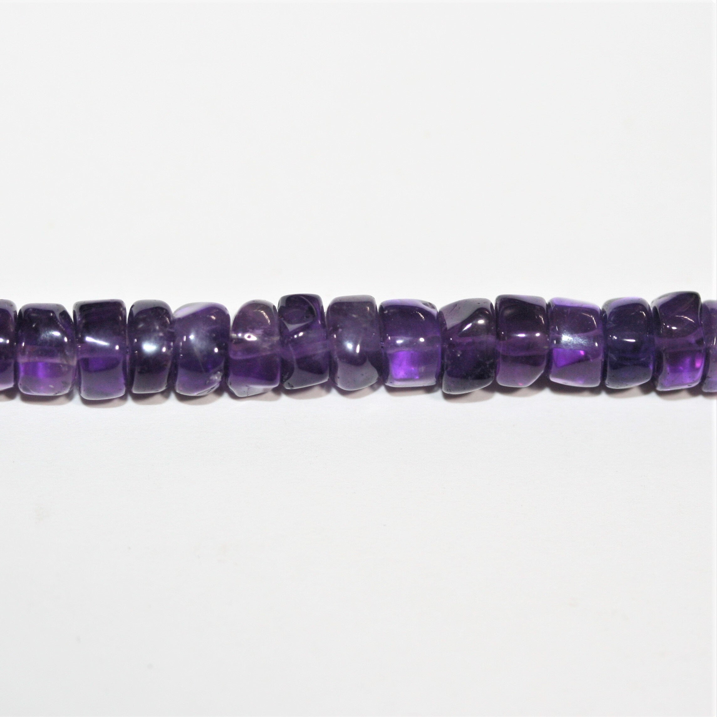 13" St Amethyst Smooth Disc Beads 6x3mm. Approx.- Strand 33cm.