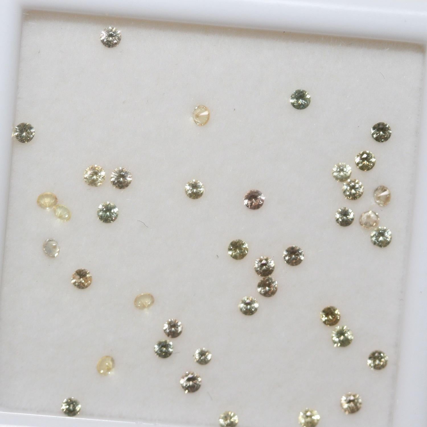 Lote de zafiro amarillo redondo facetado de 1,75 mm. Aprox. 1 quilate.