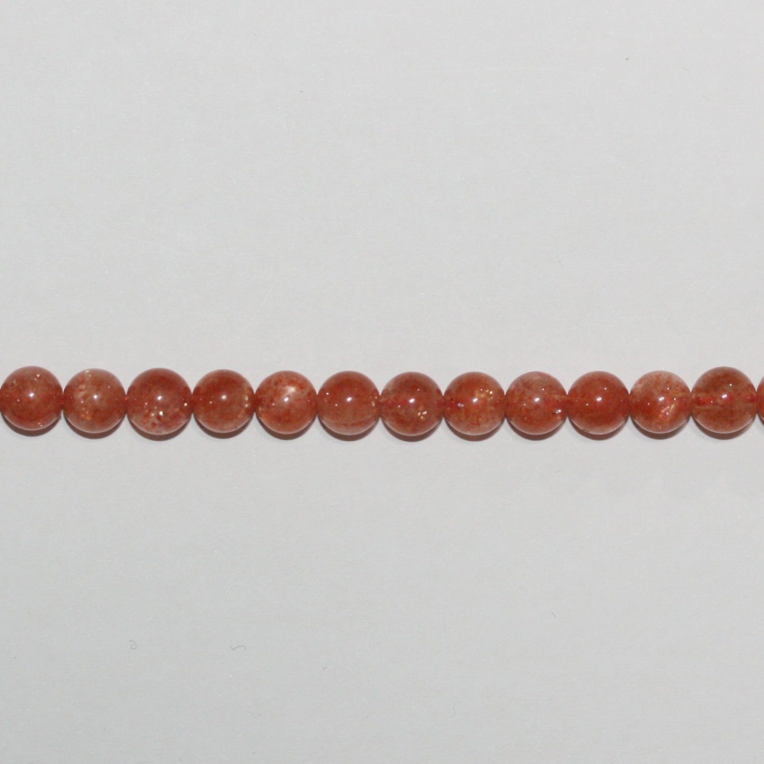 Cuentas redondas lisas de piedra solar de 16" (5-5,5 mm) - Hilo de 40 cm