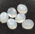 Lote de 6 cabujones ovalados de piedra lunar blanca de 11 x 9 mm. (6 uds.)