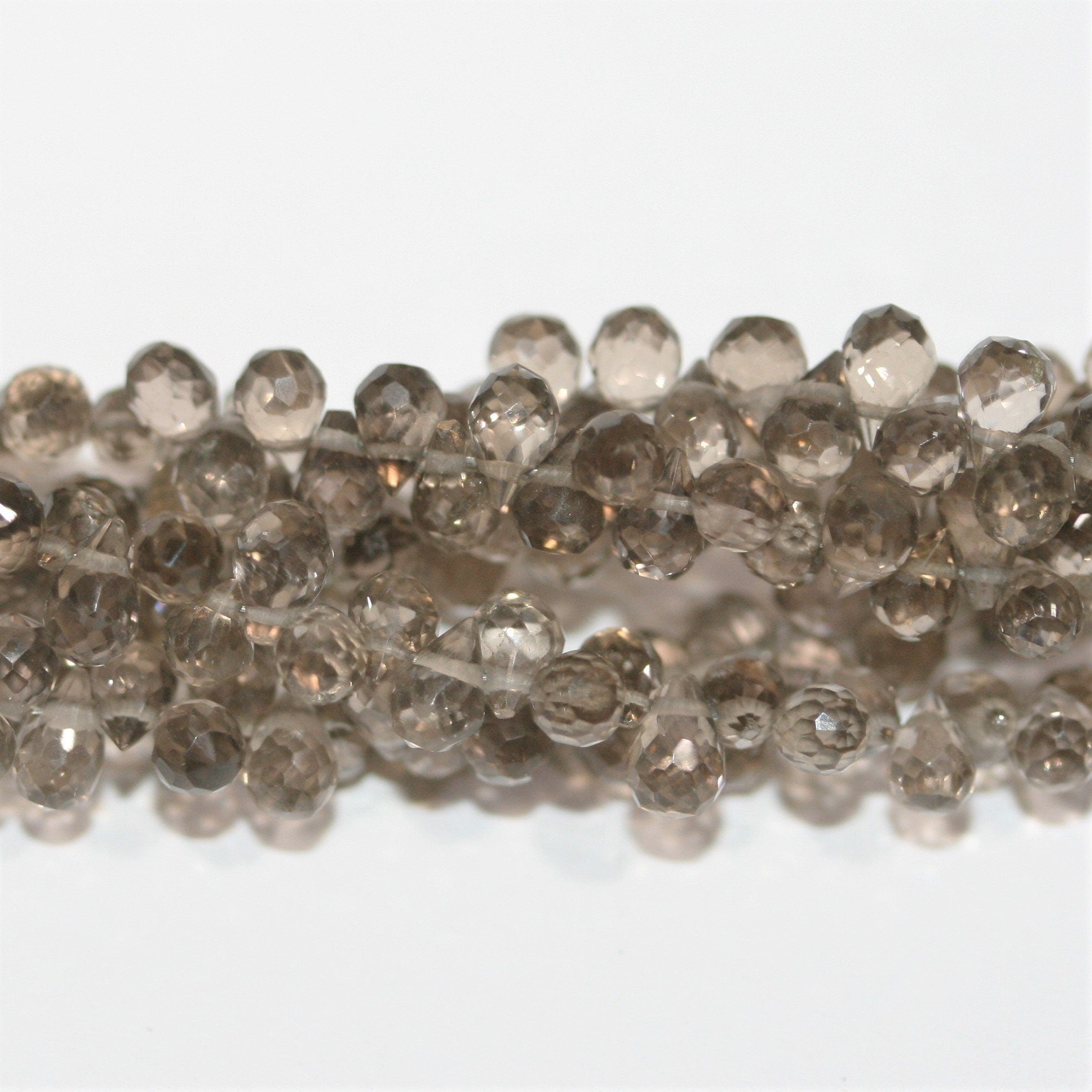 Perles en quartz fumé facettées St 8" 5x3mm.-Rig 20cm.