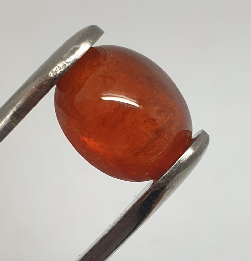 Spessartine Garnet Oval Cabochon 13x10.4mm. (10.34ct.).