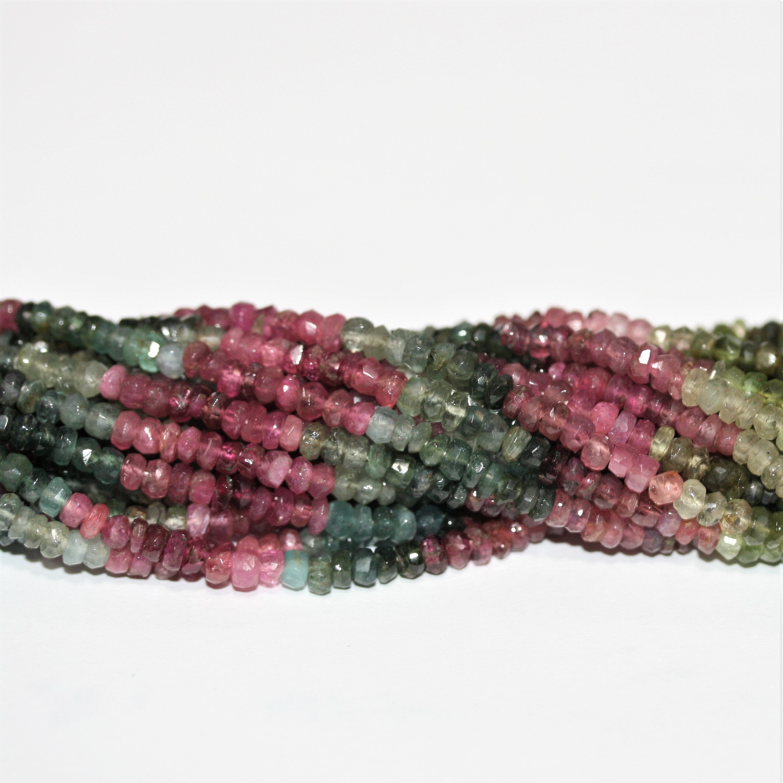 Perles rondelles à facettes en tourmaline St de 14 pouces (3,5 x 2,5 mm). Longueur approximative du fil : 35 cm.