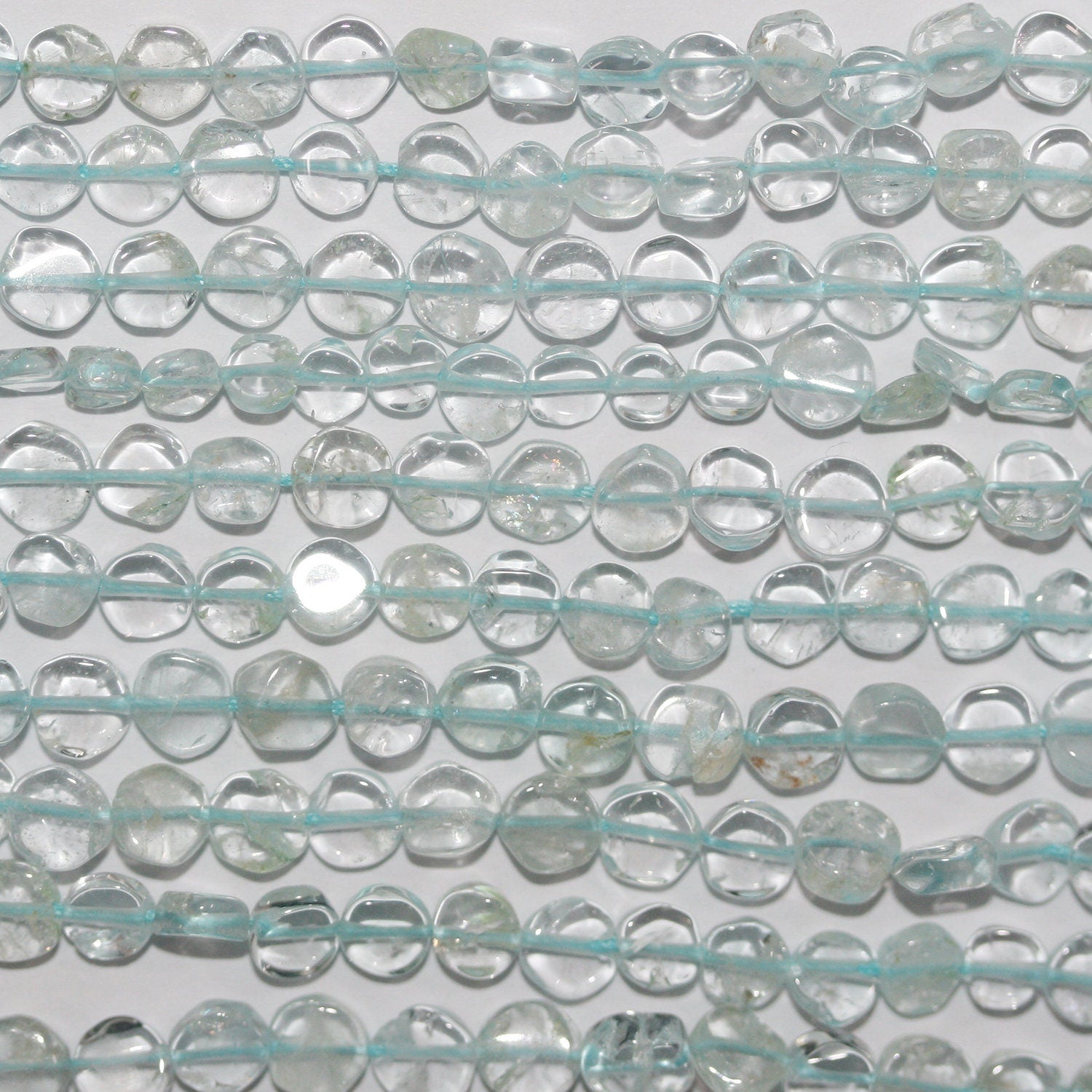14" St Aquamarine Smooth Coin Beads 4-5mm.Approx.-Strand 37cm.