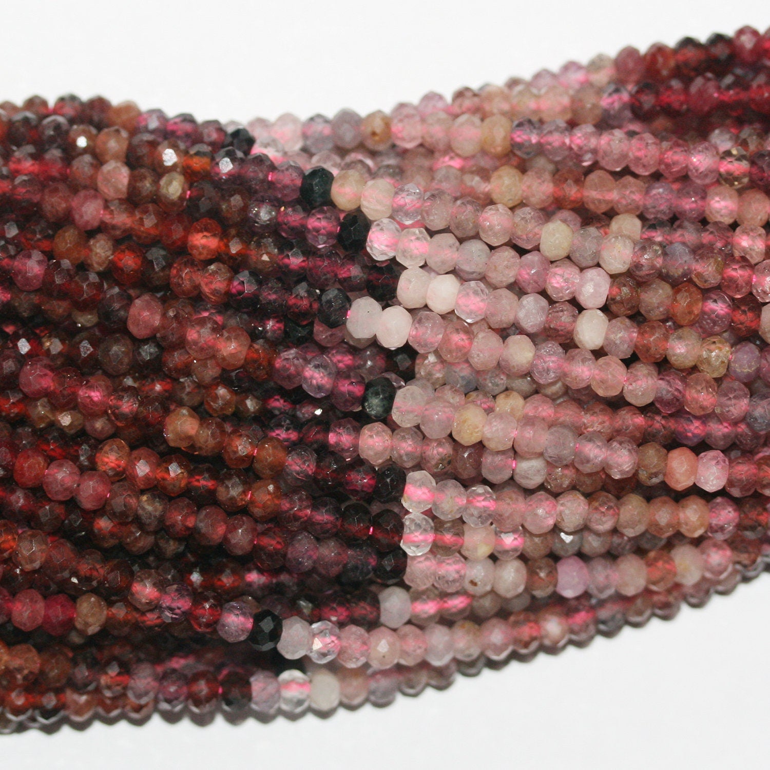 Perles rondelles à facettes en spinelle multicolore 15" (4 x 3 mm) - Fil de 39 cm