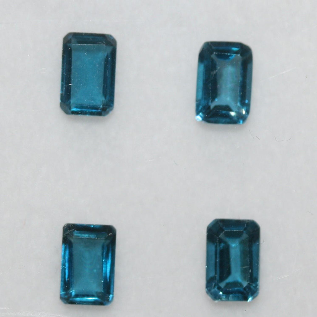 4 Pcs Lot of London Blue Topaz Faceted Octagon 7x5mm.(4Pcs)