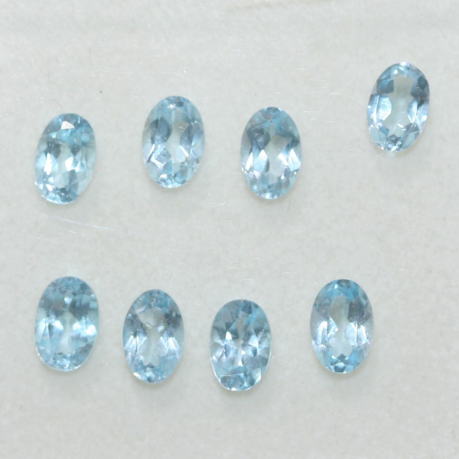 Lote de 8 topacios azul cielo facetados ovalados de 6 x 4 mm. (8 piezas).