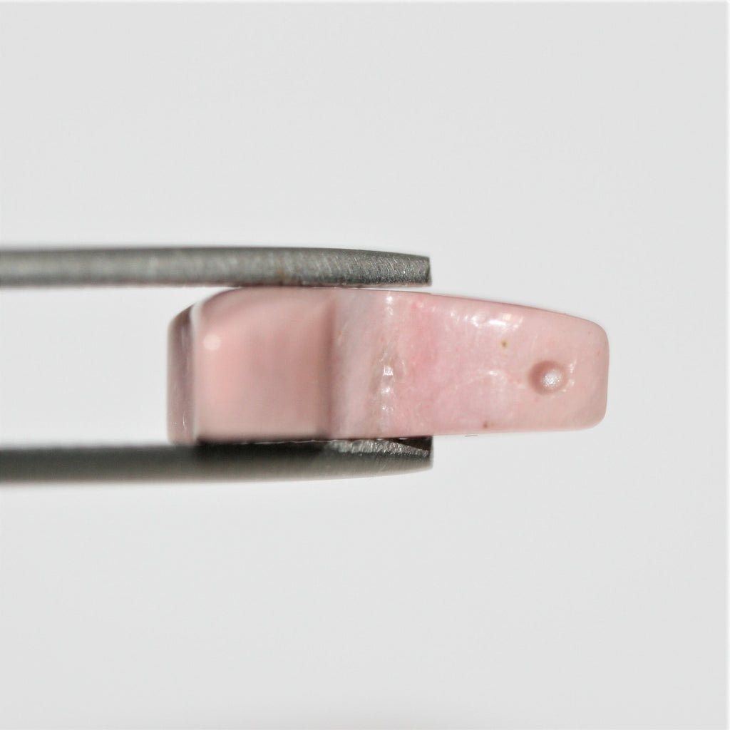 Pendentif papillon lisse en rhodonite 18x12mm. Environ.