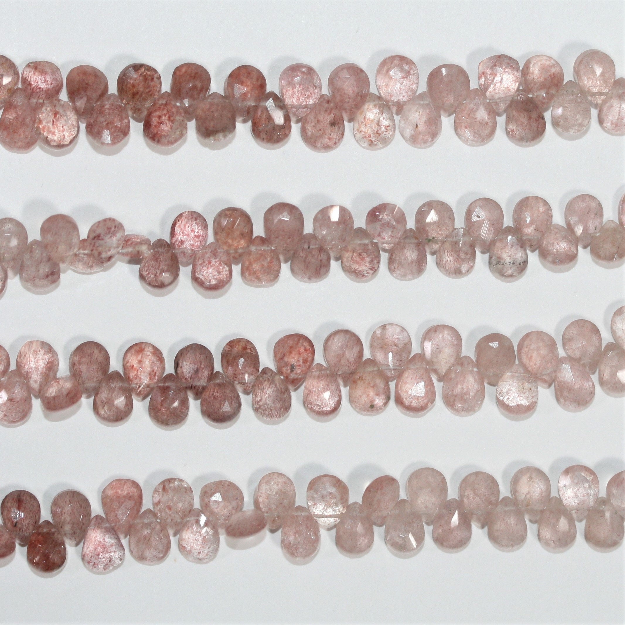 Cuentas de cuarzo cereza facetadas de 7" x 5 mm - Hilo de 18 cm.