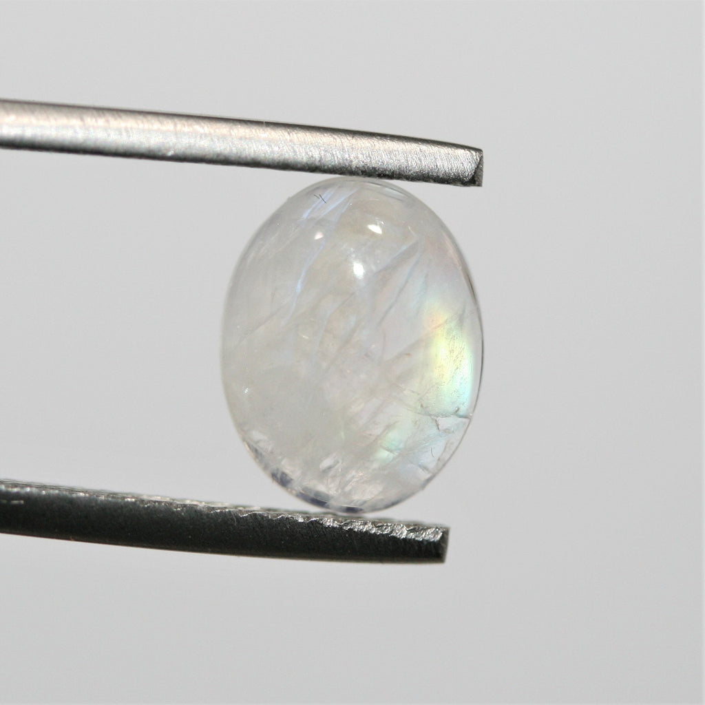 4 cabochons ovales lisses en pierre de lune 10x8mm.- (4 pièces)