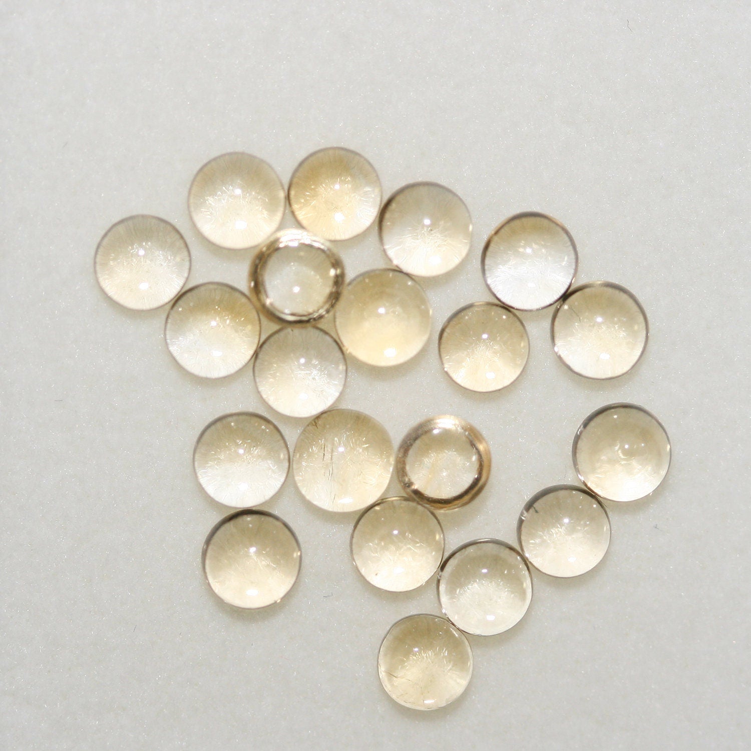 Lote de 20 cabujones redondos de citrino de 4 mm. (20 uds.)