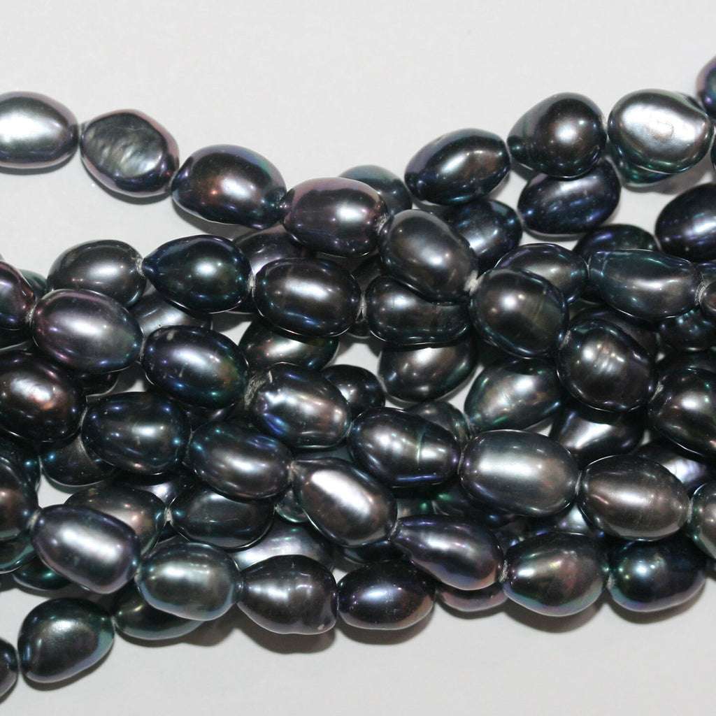 Perles ovales noires d'eau douce, 15 pouces (environ 38 cm), 7-8 mm. Collier de 39 cm. Perles naturelles à prix de gros.
