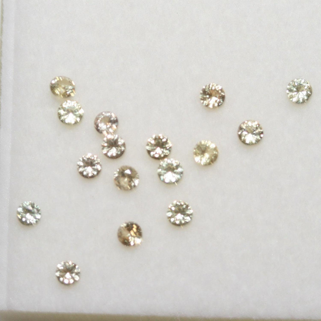 Lote de zafiro amarillo redondo facetado de 2,3 mm. Aprox. 1 quilate.