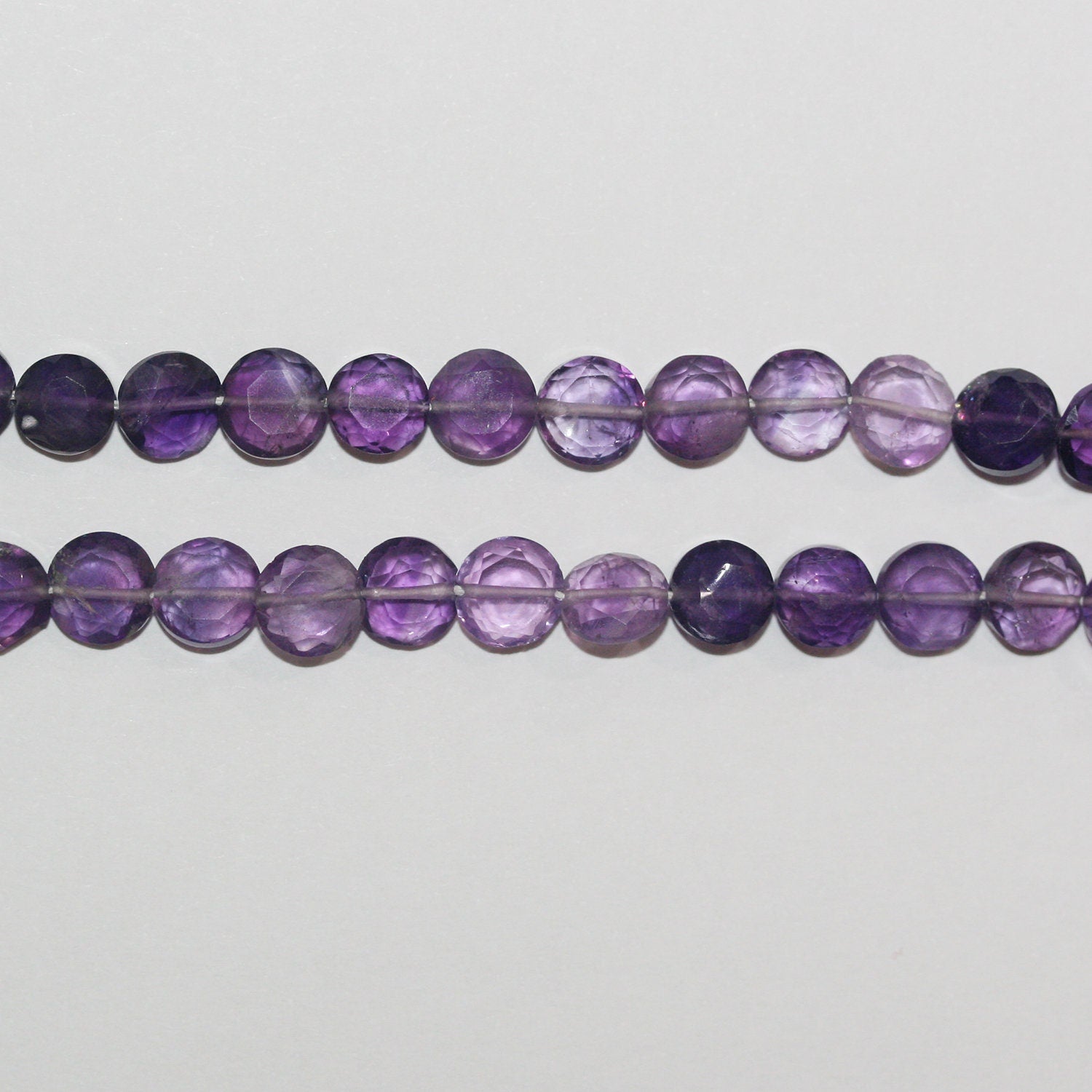 13" St Amethyst Faceted Coin Beads 6-7mm.- Strand 35cm.