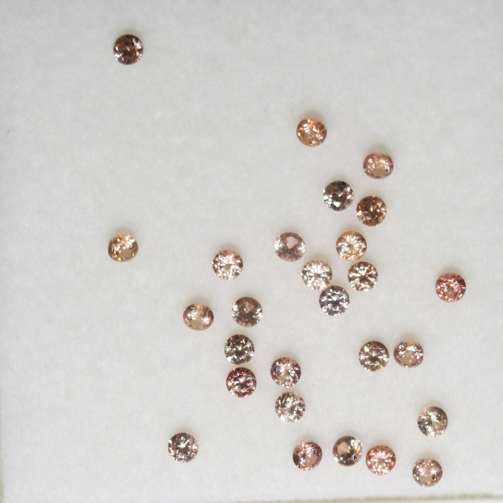 Saphirs orange ronds à facettes, lot de 2 mm environ (environ 1 carat).