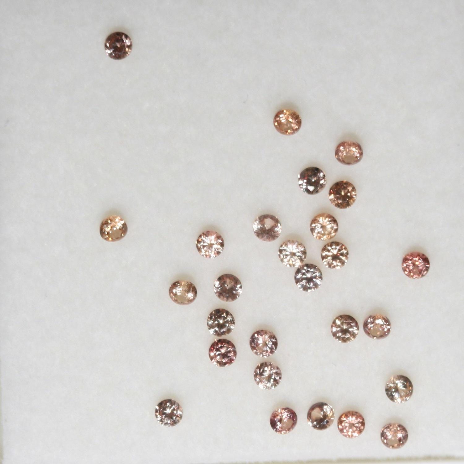 Saphirs orange ronds à facettes, lot de 2 mm environ (environ 1 carat).