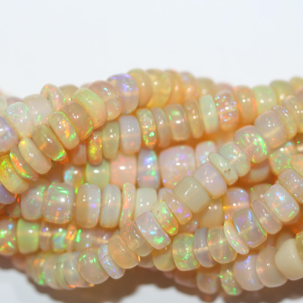 Cuentas redondas lisas de ópalo etíope de San Etiopía de 40 cm, 6 x 3 mm (aprox.). Hilo de 40 cm.