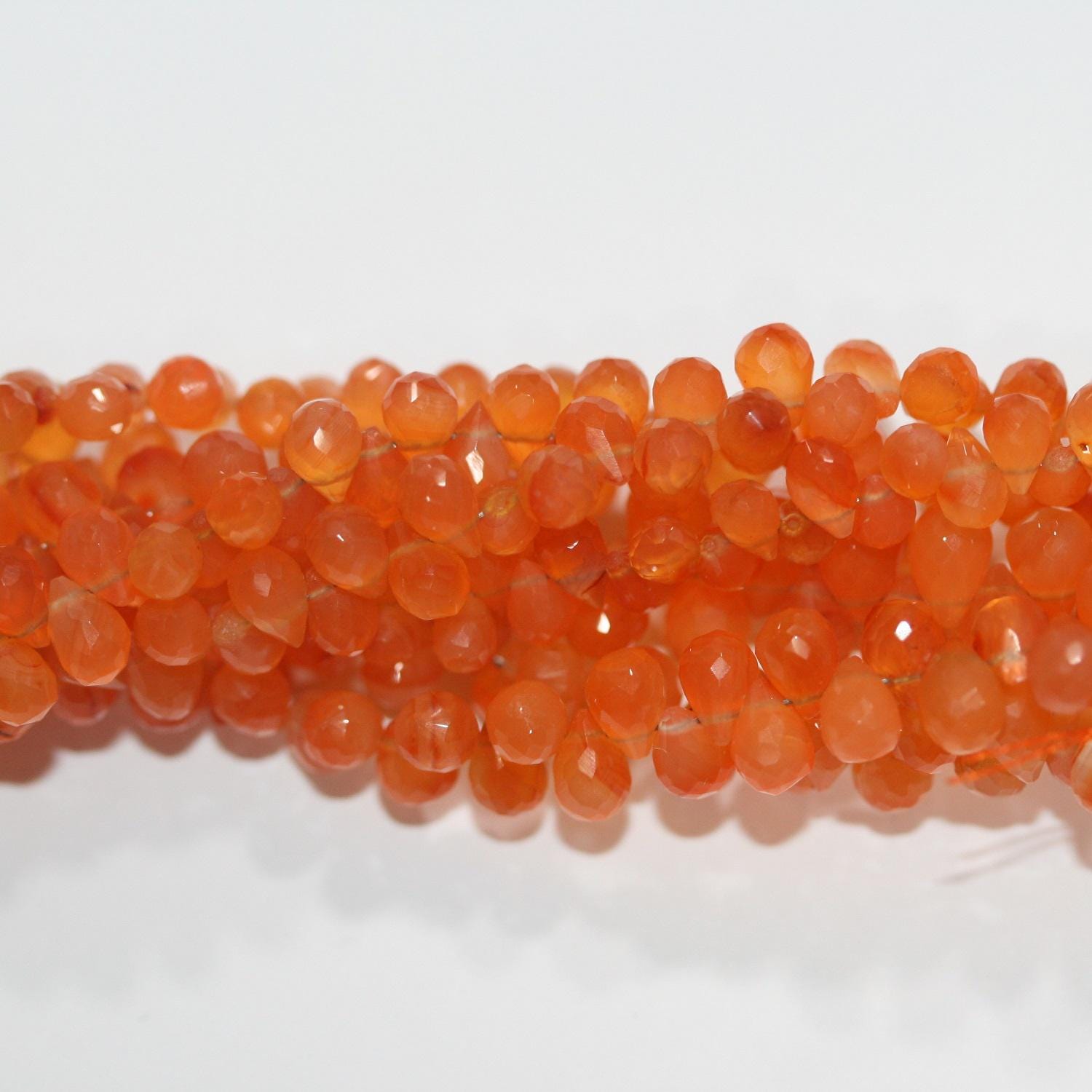 Cuentas de cornalina santa facetadas de 8" (6 x 4 mm). - Aprox. - Hilo de 20 cm