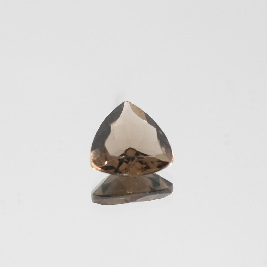 Lote de 4 trillones de cuarzo ahumado facetado de 10 mm.